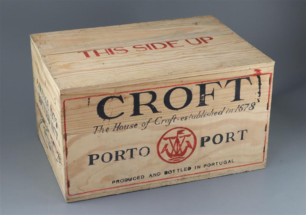 A case of Croft 1975 vintage Port, bottled 1977, original opened wooden crate (12 bottles)